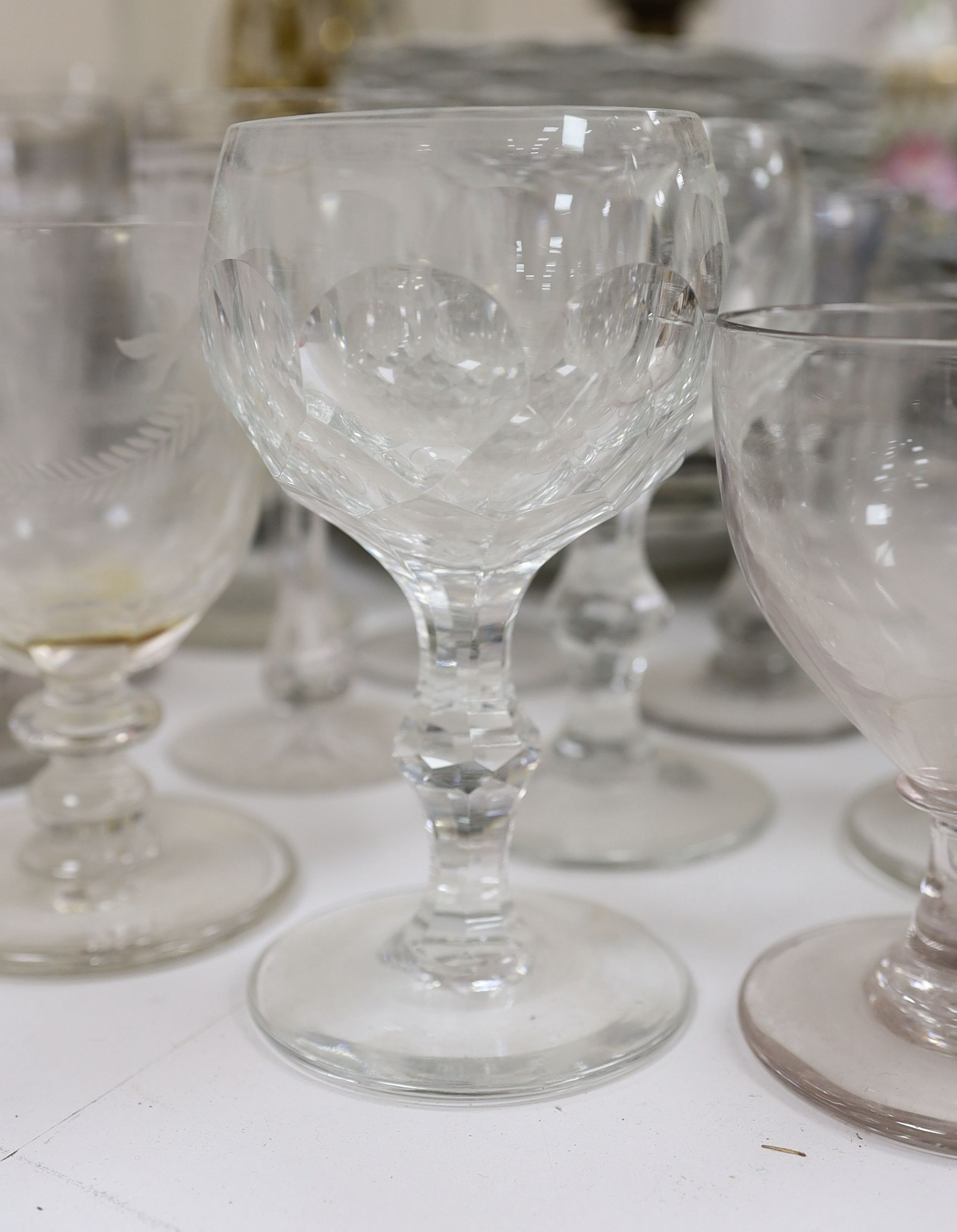 A collection of mostly 19th century rummers and ruby etched glass wine glasses, flutes etc.